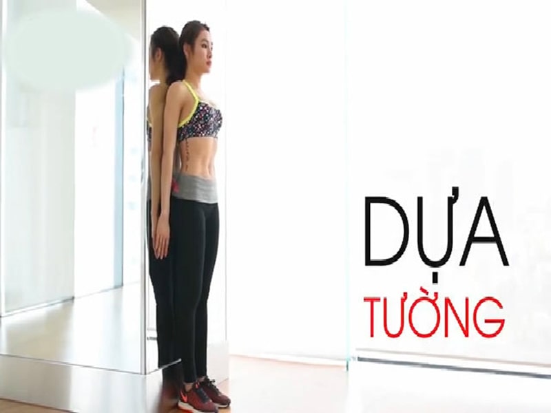 dua thang tuong giup lung cọt song luon thang Dựa thẳng tường giúp lưng cột sống luôn thẳng